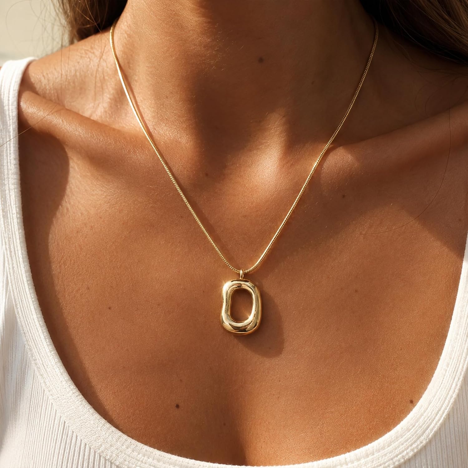 Abstract Gold Tone Pendant Necklace